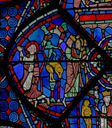 La ventana de San Tomás: mientras reza, un demonio rompe estatuas paganas