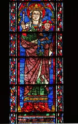 La Virgen (sosteniendo una flor) y el Niño dando bendición