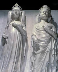 Los depósitos de mármol de la Reina Juana de Evreux (1307-1371) y el Rey Carlos IV El Hermoso (1294-1328). Es el mismo modelo que el de Maubuisson, hecho por orden de la reina por Jean de Liege (conocido alrededor de 1357-1381). Basílica de Saint Denis, ne
