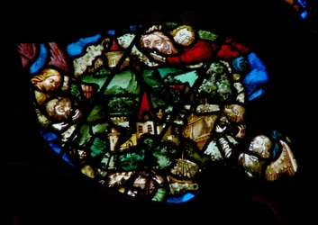 La ventana rosa oeste representando una escena del Libro de Apocalipsis: Ángeles reteniendo el viento de la tierra y los barcos del mar (7:1)