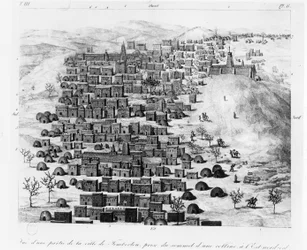 Vista de parte de la ciudad de Tombuctú tomada desde una colina al este, de Voyage a Tombouctou por Rene Caillie, publicado en 1830