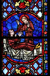 Ventana w04 que representa a un monje santo apareciendo a San Martín