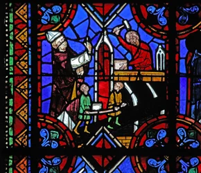 Ventana w06 que representa la construcción de una iglesia
