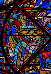 Ventana w15 que representa la historia de las reliquias de San Esteban: A pesar de los esfuerzos de los demonios, el barco que lleva las reliquias sobrevive al viaje - otros barcos se hunden