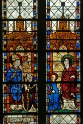 Ventana w17 que representa a San Nicolás y el donante Oudin de Troyes; Santa Ana y la Virgen María
