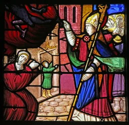 Ventana w19 que representa la Vida de San Remigio. Libera un alma poseída