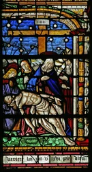 Ventana que representa la Piedad