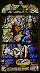 Ventana w1 que representa a Cristo lavando los pies de Sus discípulos
