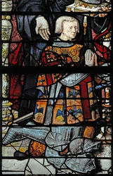 Ventana w1 que representa a Guillaume de Montmorency, el donante