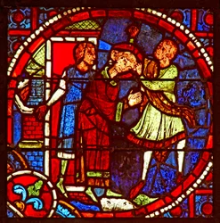 Ventana que representa a San Esteban siendo llevado para ser apedreado