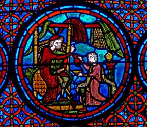 Ventana w23 que representa la Parábola del Rico y Lázaro