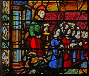 Ventana w2 que representa a San Juan con los donantes y (¡muchas!) hijas