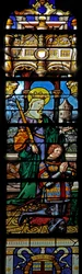 Ventana w3 que representa a Santa Bárbara con un donante