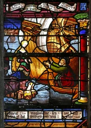 Ventana w5 que representa al Duque de Marsella regresando de Jerusalén y encontrando a su esposa en la roca con un hijo