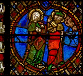 Ventana w6 que representa una escena de la Vida de la Virgen María: José es tranquilizado