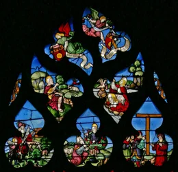 Ventana w8 que representa a San Juan Bautista, San Juan Evangelista, Abraham e Isaac, Moisés y la zarza ardiente y la Elevación de la Cruz