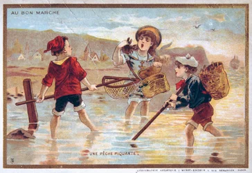 postal de época con niños en la playa