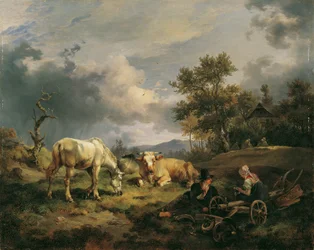 Joven pareja campesina descansando en el campo