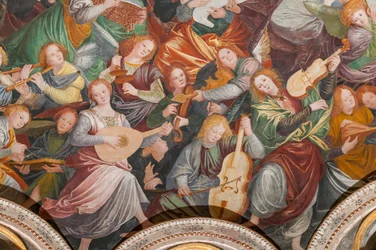 Detalle de la Asunción de la Virgen, conocido como "El coro de ángeles tocando música", Cúpula del crucero, de 1534 (fresco)