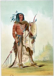Indios de América: retrato de un jefe indio que se convirtió en médico y sostiene un tam-tam (tam-tam) en el que se encuentran los remedios. Ilustración de George Catlin (1794-1872)