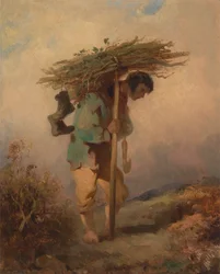 Un hombre llevando ramas