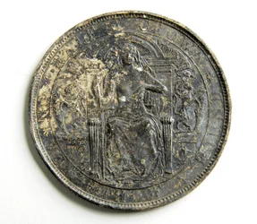 Prueba de fundición para una moneda