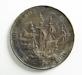 Prueba de fundición para una moneda (metal plateado)