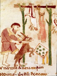 Un carnicero corta una cabra (miniatura, siglo IX)
