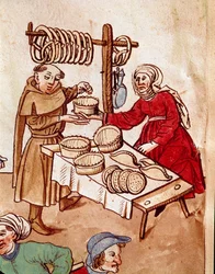Comercio: un vendedor de pan. Miniatura de la «Crónica del Concilio de Constanza» de Ulrich Richental (1360-1437), hacia 1438. Praga, Biblioteca Nacional