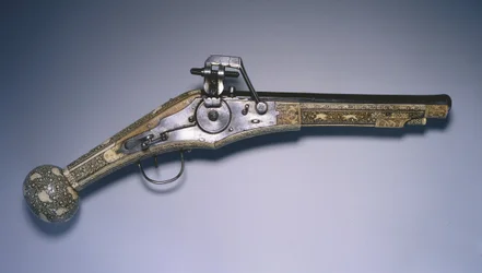 Pistola de caza de llave de rueda