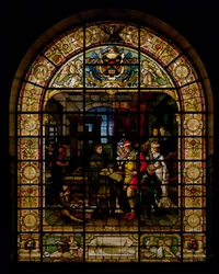 William Caxton mostrando su primer libro impreso a Eduardo IV y su esposa, Elizabeth Woodville en 1477