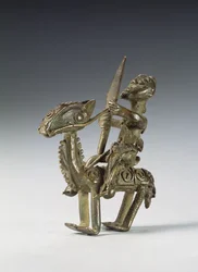 Jinete en caballo con arnés decorativo