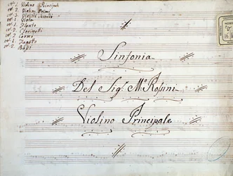 Detalle de la primera página de la partitura musical para violín de una sinfonía de Gioacchino Rossini