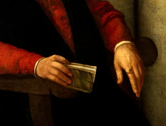 Presunto retrato de François Rabelais (1494-1553), escritor y médico francés. Detalle del libro que sostiene en su mano y del caballero que lleva en su dedo. Pintura de Giovanni Battista Moroni (1525-1578)