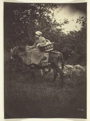 Campesina montando un burro