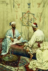 Árabes jugando al backgammon en un interior