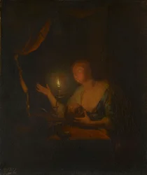 La Magdalena penitente a la luz de las velas