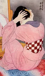 Una mujer japonesa arreglándose el cabello, décadas de 1920-1930