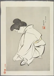 Mujer cortándose las uñas de los pies, después de 1929