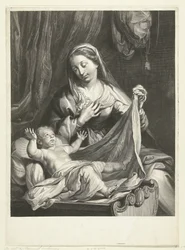 María con el Niño Jesús en el pesebre
