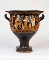 Un campaniano bell-krater por el pintor Ca que representa a un guerrero sentado y dos mujeres, siglo IV a.C.