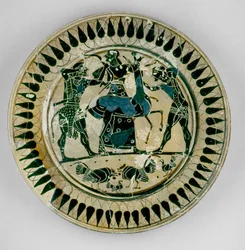 Plato de figuras negras ático decorado con una escena de Hércules y Apolo luchando por un ciervo y siendo separados por Artemisa, al estilo de Lydos, de Grecia, c.560 a.C.
