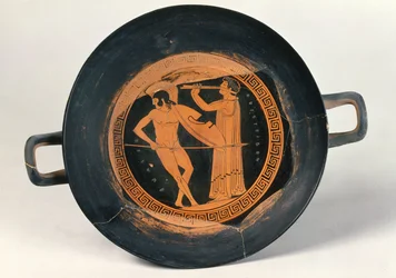 Copa de figuras rojas griegas, que representa a un guerrero bailando el Pírrico, por Aristeides el Viejo
