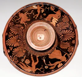 Patera con ménade y Eros (terracota, 325-300 a.C.)