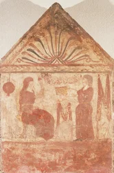 Lápida pintada que muestra a una mujer sentada en un trono hilando, procedente de Andriuolo-Laghetto en Paestum, Campania, Italia.