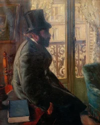 Hombre con sombrero de copa, sentado cerca de la ventana