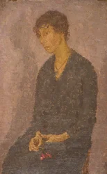 Mujer sosteniendo una flor