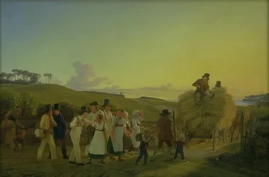 Campesinos regresando del campo con la última carga de grano