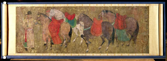 Un mozo con caballos