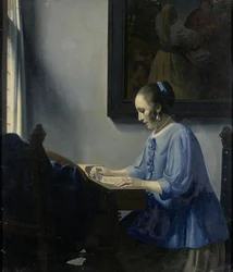 Mujer leyendo música